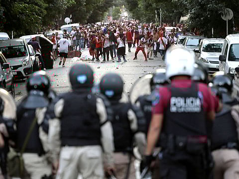River Plate's fans clash with riot police after the Copa Libertadores Final, Second leg v Boca Juniors match was postponed. 