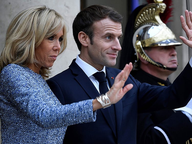 Emmanuel Macron and his wife