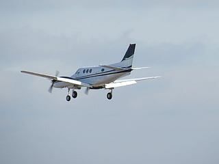 Distress calls captured as pilot crashes onto Gainesville road, striking vehicles. For illustrative purposes only.