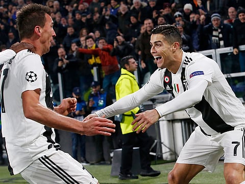 Mario Mandzukic, left, celebrates with Cristiano Ronaldo after scoring for Juventus.