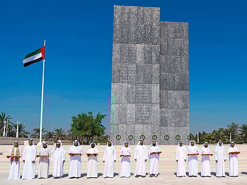 His Highness Shaikh Mohammad Bin Rashid Al Maktoum, Vice-President and Prime Minister of the UAE and Ruler of Dubai, His Highness Shaikh Mohammad Bin Zayed Al Nahyan, Crown Prince of Abu Dhabi and Deputy Supreme Commander of the UAE Armed Forces, and Their Highnesses the Supreme Council Members and Rulers of the Emirates, Crown Princes and Deputy Rulers during Commemoration Day observance at Wahat Al Karama in Abu Dhabi.