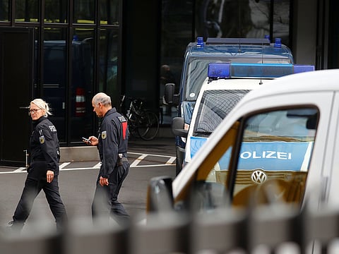 Police walks in front of Deutsche Bank headquarters as roughly 170 criminal police officers, prosecutors and tax inspectors searched Deutsche Bank offices in and around Frankfurt, Germany, November 29, 2018, on money laundering allegations. 