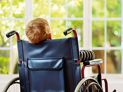 A boy on a wheelchair. For illustrative purposes only.