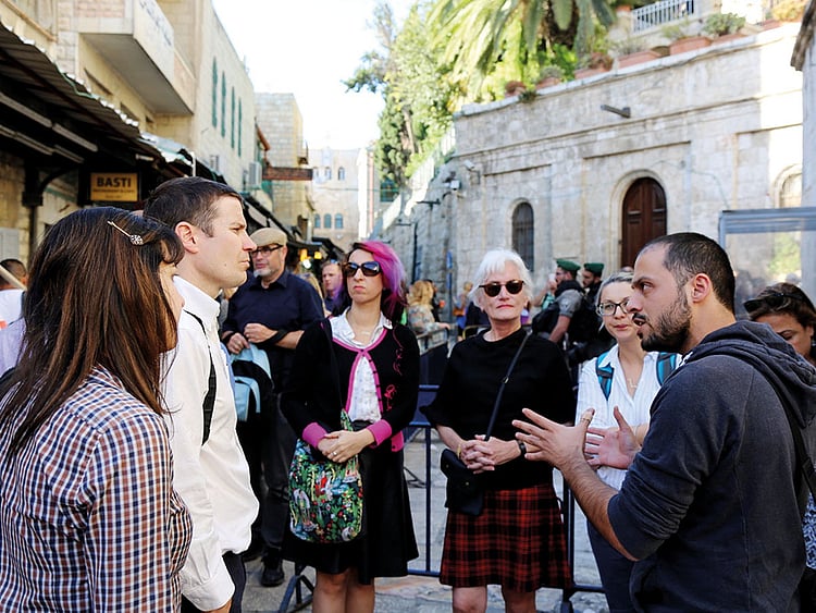 writers-listening-to-tour-guide-in-Jerusalem-(Read-Only)