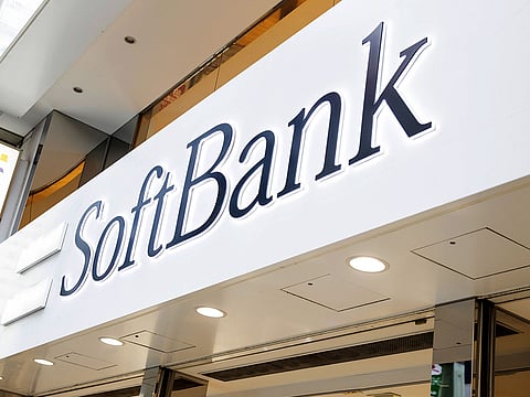 Signage for SoftBank Group Corp. is displayed outside one of the company's stores in Tokyo, Japan.