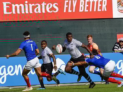 JKalione Nasoko of Fiji in action playing against France on day two of the Emirates Dubai Rugby Sevens.