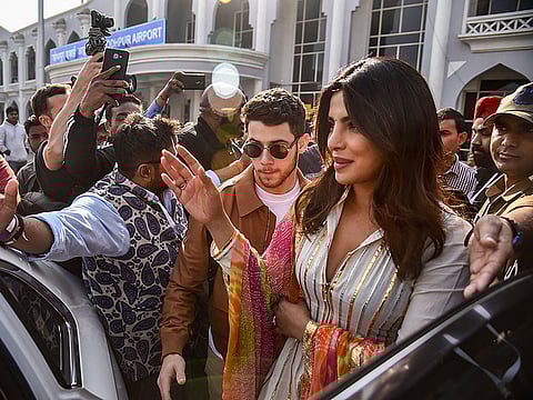 Bollywood actor Priyanka Chopra with her fiance American singer Nick Jonas arrive for their wedding ceremonies, in Jodhpur, Thursday, Nov. 29, 2018. 