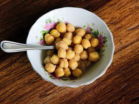 Make a smooth dip of hummus with a bowl of chickpeas