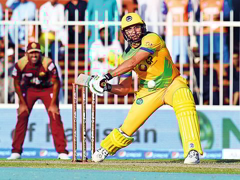 Pakhtoons skipper Shahid Afridi prepares for a big one  during his unbeaten half century against Northern Warriors at the Sharjah Cricket Stadium.