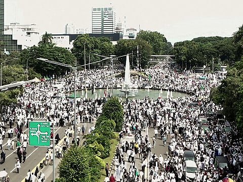 An aerial picture shows thousands of Indonesian Islamic hardliners taking part in a rally in Jakarta, on December 2, 2018, during the second anniversary of protests calling for blasphemy charges against Jakarta's former governor. 