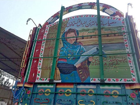 A unique idea of using trucks to serve as moving billboards for spreading the message of girls rights is gaining momentum as drivers are agreeing to the idea and changing paintings on rear of their vehicles. (Match the picture with APP Feature slugged Trucks in Pakistan serving as `moving billboards to spread awareness on girls rights already been released. 