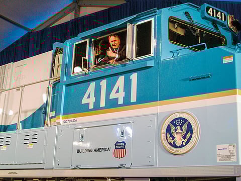 George H.W. Bush looks out of the cab of Union Pacific locomotive 4141 at its 2005 unveiling in College Station, Texas. 