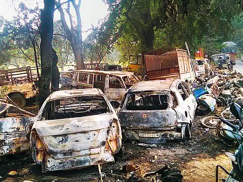 Charred vehicles which were set on fire by a mob in Monday’s violent clashes in Uttar Pradesh over the alleged illegal slaughter of cattle, in Bulandshahr.