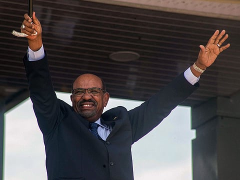 Sudan's President Omar Al Bashir gestures during a peace ceremony at John Garang Mausoleum in Juba, South Sudan. 