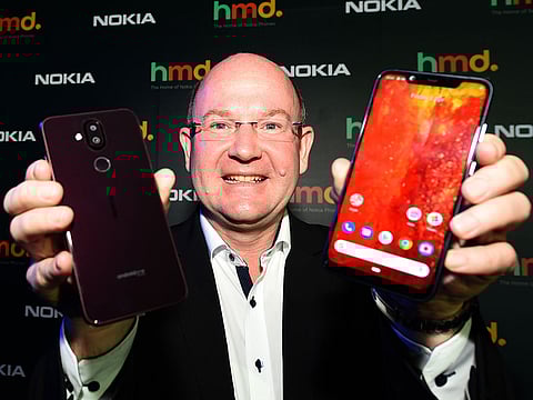 Dr Florian Seiche, CEO of HMD Global, the company that makes Nokia phones, with the Nokia 8.1 in Dubai on December 5, 2018.