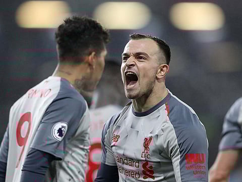 Liverpool's Xherdan Shaqiri celebrates scoring their third goal.