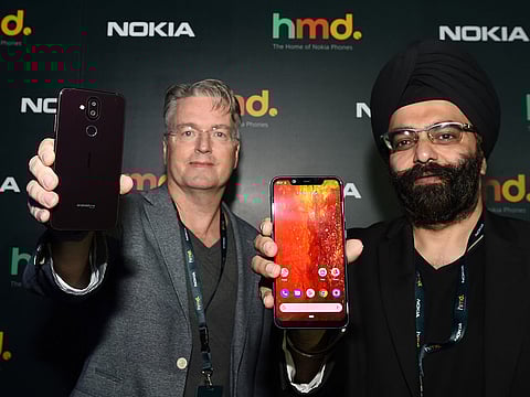 Per Ekman, Vice President-Middle East and North Africa of Nokia and Sanmeet Singh Kochhar, General Manager Middle East of Nokia showing the Nokia 8.1 during the unveiling of the next chapter of Nokia at Address Montgomerie Dubai.