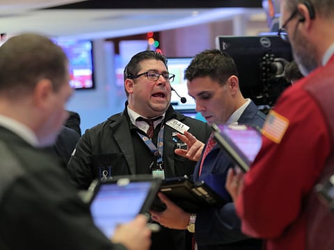 Traders work on the floor of the New York Stock Exchange. The US presidential election less than a month away, stress-levels among most market participants are expected to be tested in the weeks to come.