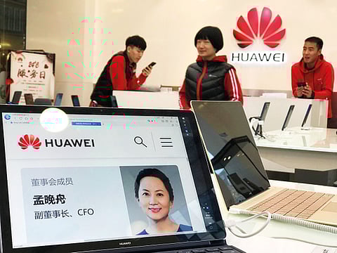A profile of Huawei's chief financial officer Meng Wanzhou is displayed on a Huawei computer at a Huawei store in Beijing, China, Thursday, Dec. 6, 2018.