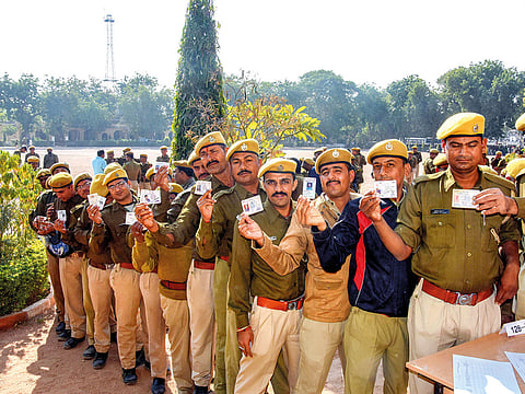 Police personnel on poll duty wait to cast their postal ballots for Rajasthan Assembly elections, in Jodhpur, Dec 2, 2018.