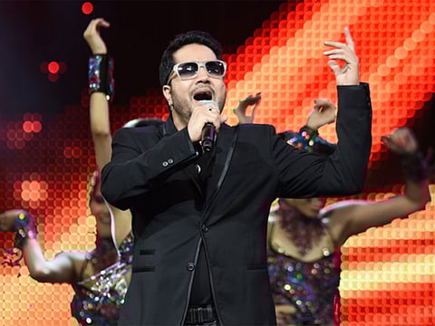 Bollywood singer Mika Singh performs on stage at the Mid Florida Credit Union Amphitheater during the IIFA Magic of the Movies show on the third day of the 15th International Indian Film Academy (IIFA) Awards in Tampa, Florida, April 25, 2014.