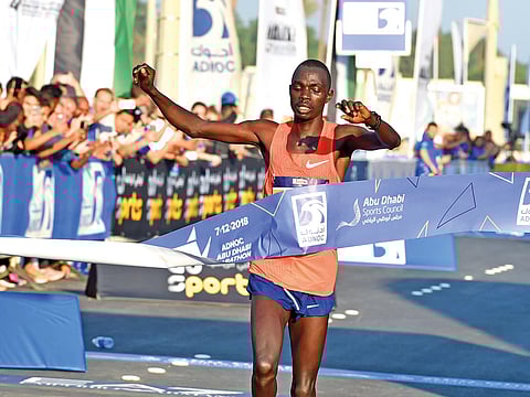 Marius Kipserem takes the top spot to win the men’s category of the Abu Dhabi Marathon.