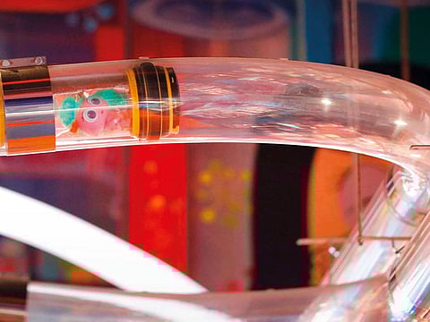 A baby from planet Neonatopia arrives in the store via a pneumatic tube called the neonatal transportation system.