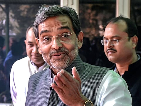 Rashtriya Lok Samata Party (RLSP) chief and Union minister of state for human resource development Upendra Kushwaha arrives to address a press conference to make an announcement regarding his resignation from the Union Council of Ministers, at his residence in New Delhi, Monday, Dec. 10, 2018.