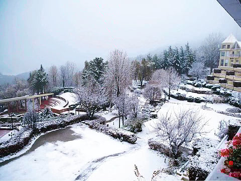 A view of first snowfall of the season in Murree. Thousands of tourists visited Pindi Point, Kashmir Point, the Mall and Ayubia, officials said.