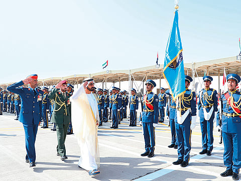 Shaikh Mohammad inspects a guard of honour by the 48th batch of aviation students at Khalifa Bin Zayed Air College.