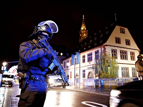 Security forces secure area where a suspect is sought after a shooting in Strasbourg, France, December 11, 2018. 