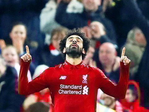 Liverpool's Mohammad Salah celebrates.