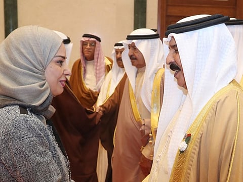 King Hamad greeting Fawzia Zainal