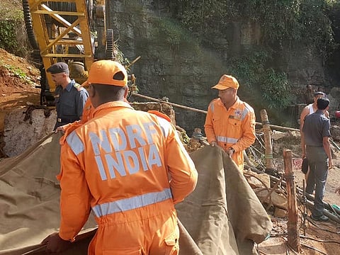 Rescuers work at the site of a coal mine that collapsed in Ksan, in the northeastern Indian state of Meghalaya, Friday, Dec. 14, 2018. 