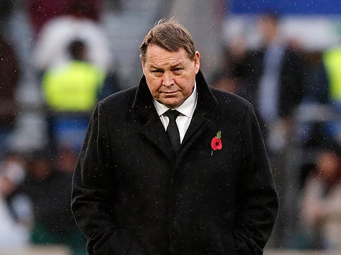 New Zealand rugby coach Steve Hansen walks on the field before the rugby union international match between England and New Zealand at Twickenham stadium in London.