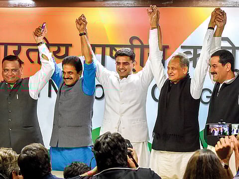 Rajasthan Congress president Sachin Pilot (centre) and chief minister-designate Ashok Gehlot (second right) at the party’s headquarters in New Delhi yesterday.