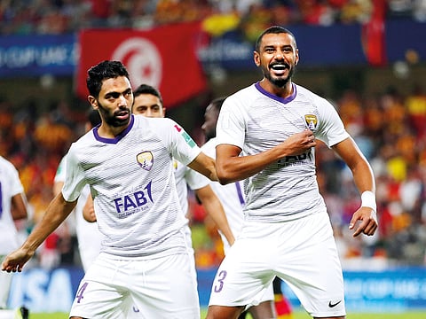 Al Ain’s Mohammad Ahmad celebrates after scoring the team’s first goal with Hussain Al Shahat in the quarter-finals against ES Tunis.