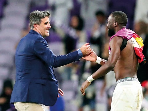 Al Ain coach Zoran Mamic celebrates after the Club World Cup quarter-final match against ES Tunis at the Hazza Bin Zayed Stadium in Al Ain.