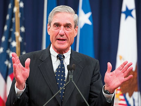 In this file photo taken on August 1, 2013, former Federal Bureau of Investigation (FBI) Director Robert Mueller speaks during a farewell ceremony in his honor at the Department of Justice.