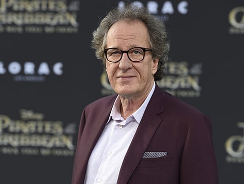 In this May 18, 2017 file photo, Geoffrey Rush arrives at the Los Angeles premiere of "Pirates of the Caribbean: Dead Men Tell No Tales" at the Dolby Theatre.