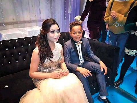 Nada (left) and Fares celebrate their controversial engagement in Egypt’s Delta province.