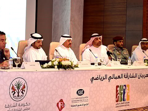 (L TO R) Fathi Afana - CEO of Fastlink ,Tariq Alkhanbashi- Founder and CEO of Reach Target.  Salem Al Qaseer, Chairman of Sharjah Labour Standards Development Authority.Issa Hilal Al Hazami, Secretary-General of the Sharjah Sports Council,Brigadier General Khalifa Al-Marri, Deputy Director General and Ammar Hassan Al Ali, Chief Inspector at the Ministry of Human Resources and Emiratisation during the press conference to announce the Sharjah Labour Sports Festival at Sharjah Chamber of Commerce and Industry.