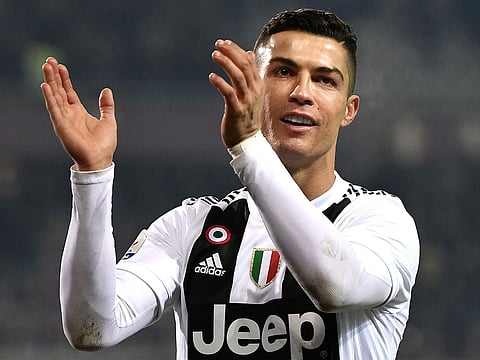 Juventus' Portuguese forward Cristiano Ronaldo applauds at the end of the Italian Serie A football match Torino vs Juventus on December 15, 2018 at the Olympic stadium in Turin.