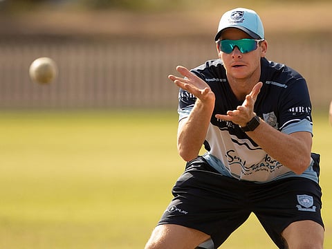 In this file photo taken on September 22, 2018 cricketer Steve Smith, Australia's ex-captain, warms up before a domestic cricket match between Sutherland and Mosman at Glenn McGrath Oval in Sutherland, a suburb in Sydney.