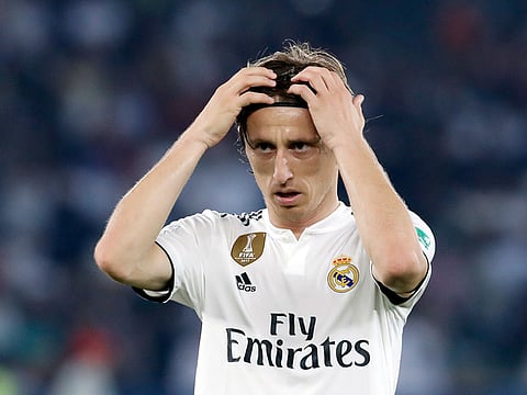 Real Madrid's midfielder Luka Modric reacts during the Club World Cup semifinal soccer match between Real Madrid and Kashima Antlers at Zayed Sports City stadium in Abu Dhabi.