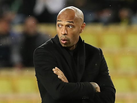 Monaco's French coach Thierry Henry reacts prior to the UEFA Champions League Group A football match between Monaco and Dortmund at the Louis II stadium in Monaco, on December 11, 2018. 
