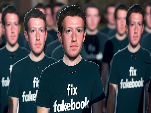 In this file photo taken on April 10, 2018, one hundred cardboard cutouts of Facebook founder and CEO Mark Zuckerberg stand outside the US Capitol in Washington, DC.