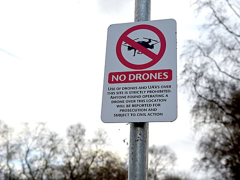 A "No Drones" sign alerting members of the public that the use of drones or unmanned aerial vehicles (UAV) is prohibited, is pictured outside Manchester United's Carrington Training complex in Manchester, north west England on December 20, 2018. 