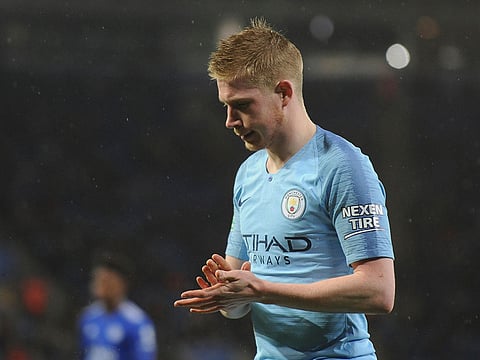 Manchester City's Kevin De Bruyne waits to take a corner kick during the English League Cup quarterfinal soccer match at the King Power stadium in Leicester, England.