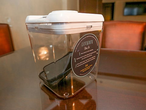 A  locked box holding cell phones during a digital detox visit to the Wyndham Grand Hotel in Chicago. 